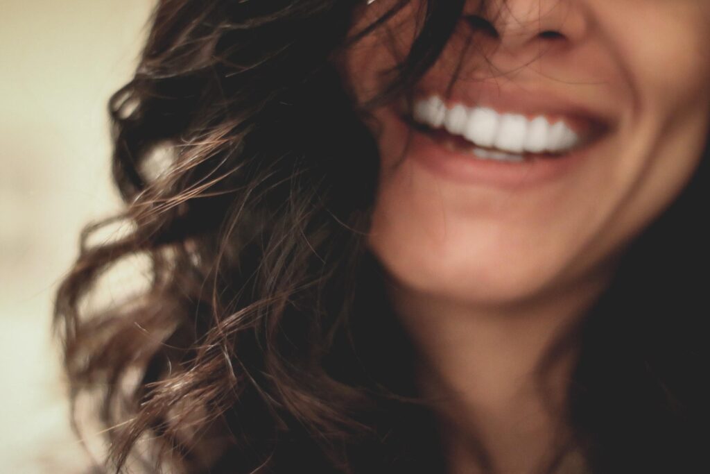 Close up of woman with dark hair smiling
