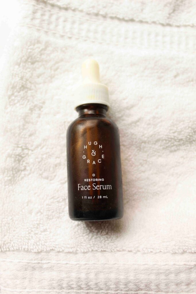 Hugh and Grace Face Serum on washcloth.