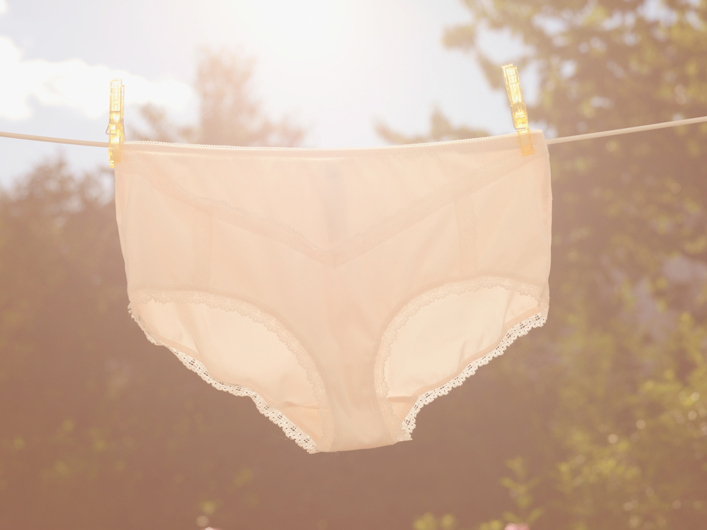 organic underwear on a clothesline outside