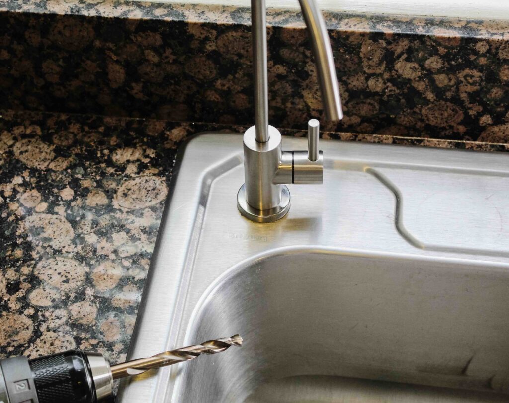 new fluoride water filter faucet installed in sink