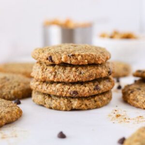 Stacked gluten free almond flour oatmeal breakfast cookies on counter.