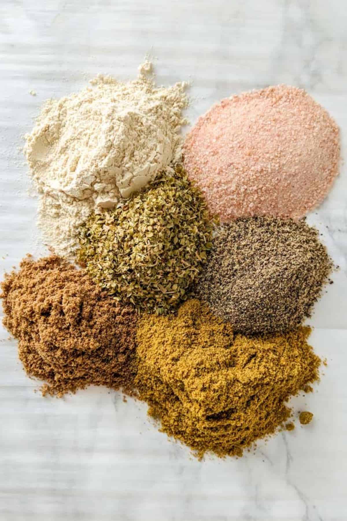 nightshade free taco seasoning ingredients on parchment paper.