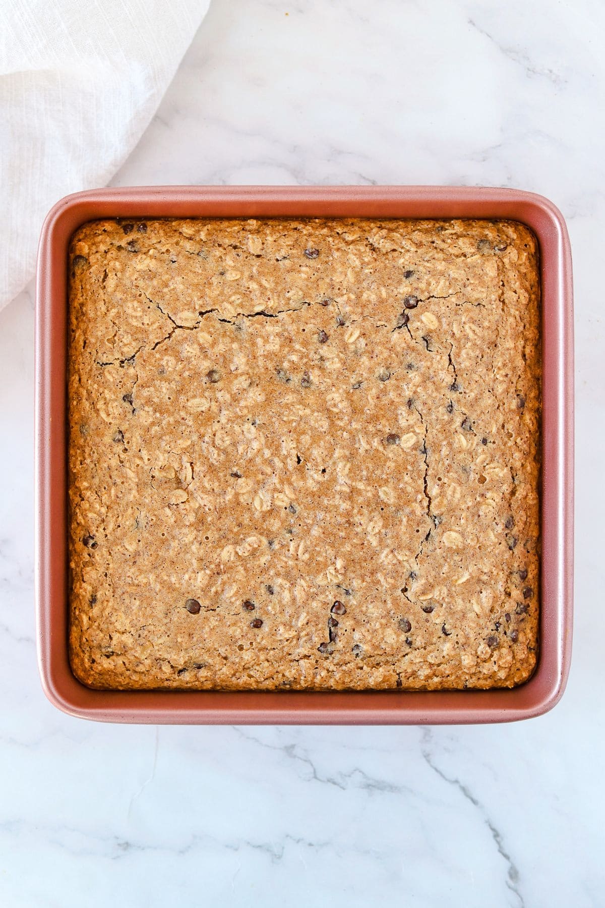 Baked simple chocolate chip baked oats (no bananas) in pan on counter.