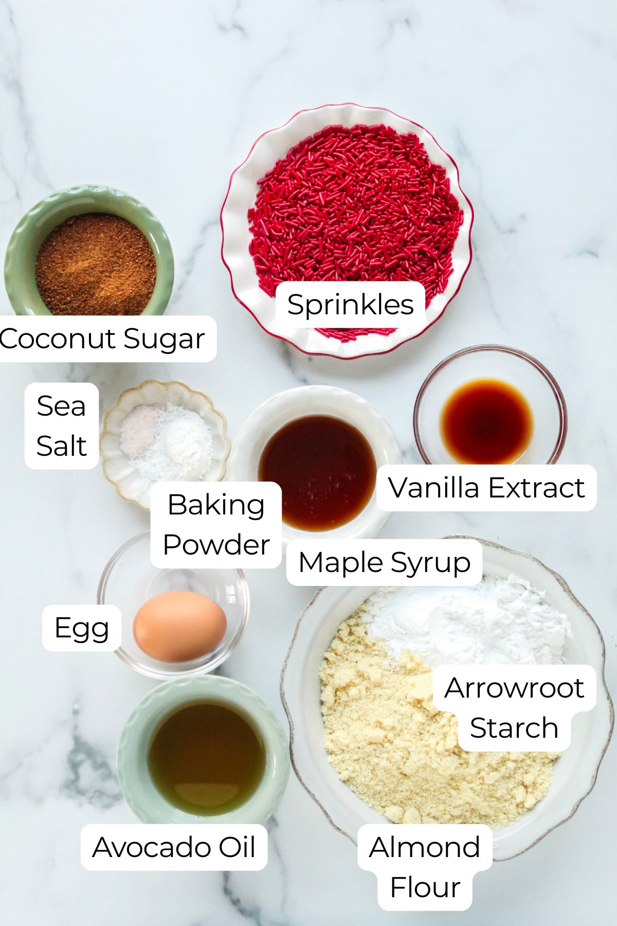 Labeled ingredients on counter for gluten free sprinkle cookies.