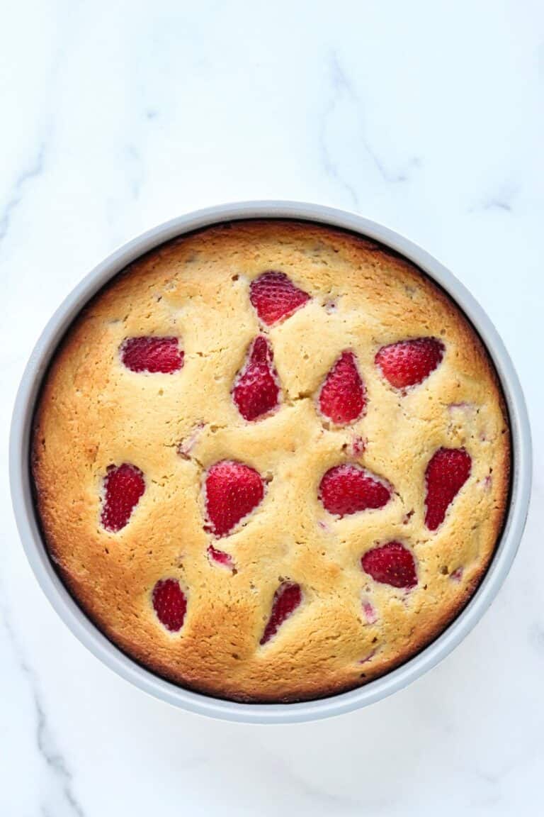 Gluten and dairy free strawberry cake fresh baked in pan.